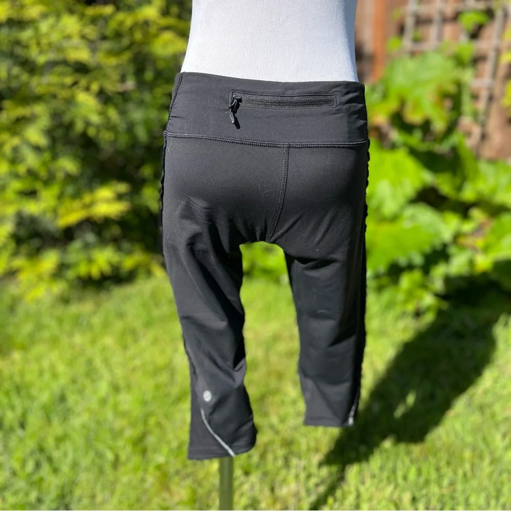 Lululemon Run Fast Free Crop Sz 8 Black, Ruffle Reflective Power Luxtreme - Picture 4 of 14